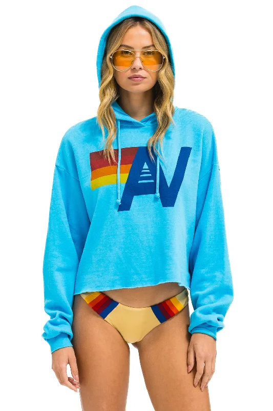 LOGO CROPPED PULLOVER RELAXED HOODIE - NEON BLUE Hoodie with Slim Fit Tailored Modern LOGO CROPPED PULLOVER RELAXED HOODIE - NEON BLUE Hoodie with Slim Fit Tailored Modern
